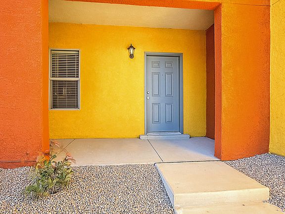 Enjoy a private, covered front porch to sit and wave at neighbors.