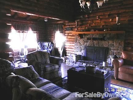 Rock fireplace has propane logs