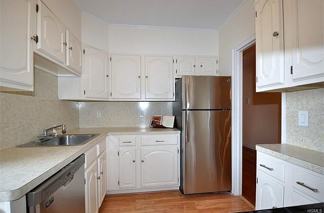 One of Scarsdale Manor largest kitchen for a 2 bedroom, 1 bath. The kitchen has new floors, window a