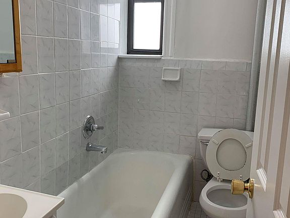 5th image of 957 67th St APT D8