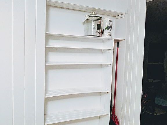 Cupboard area with shelving