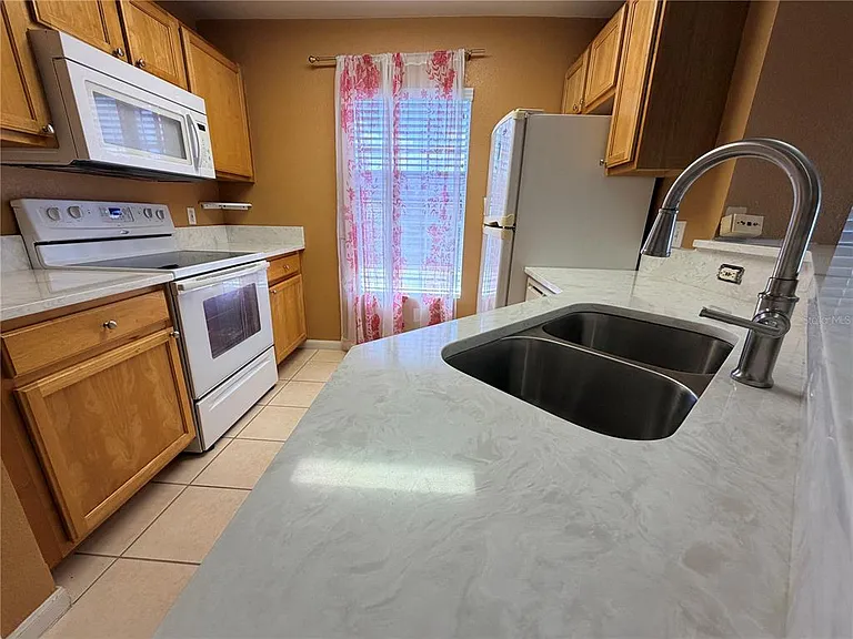 9165 Lee Vista Blvd #108 — Photo 31