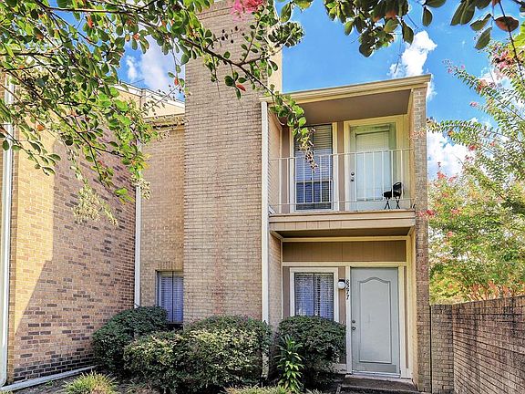 The new owner of this town home will enjoy a corner end unit enclosed by a brick wall adding extra privacy.