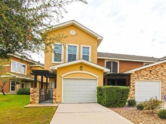 One car garage with additional parking for guests