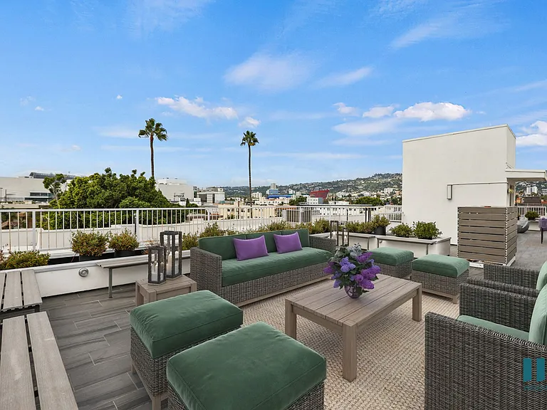 Rooftop Terrace with Entertainment and Seating Area