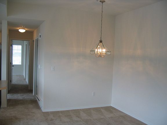 Dinning area viewed from living room. Hall goes back to Master Bedroom