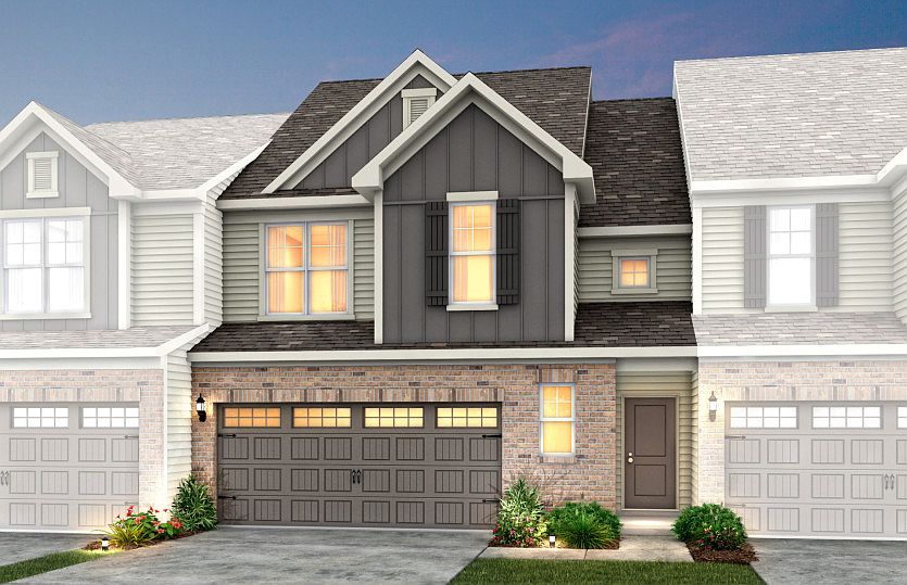 Palomino Exterior 8 features siding, brick, covered front door and 2 car front load garage