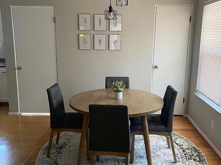 Dining room with large pantry and access to backyard and basement.