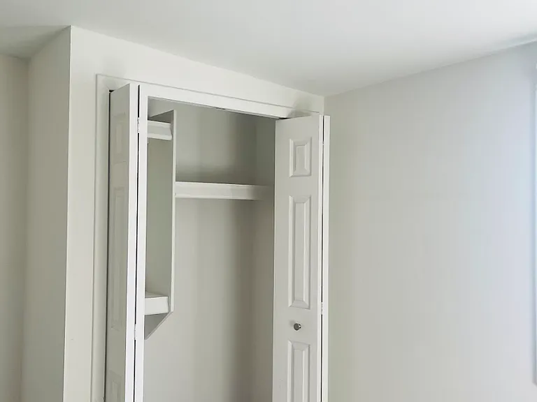Closet in the middle-sized bedroom. This house is like Goldielocks and the 3 Bears. One bedroom is BIG, one is medium (this one) and one is small.