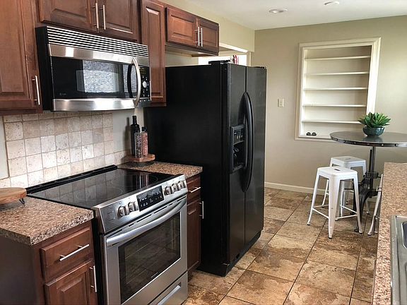 Stainless appliances, including microwave.