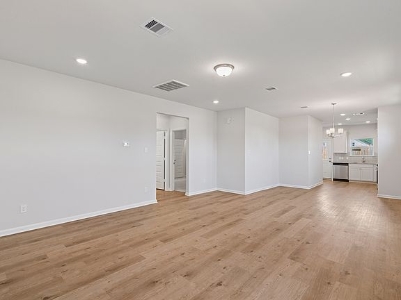 The Blue Jay II- Family Room into the Dining Area and Kitchen