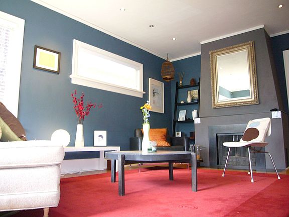 Living room w/ gas fireplace is completely pre-wired for all your A/V equipmt.