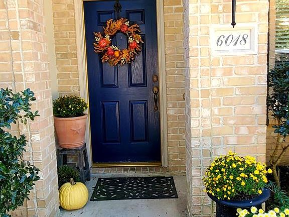 Solid wood Entry door recently refinished. Come on in!!