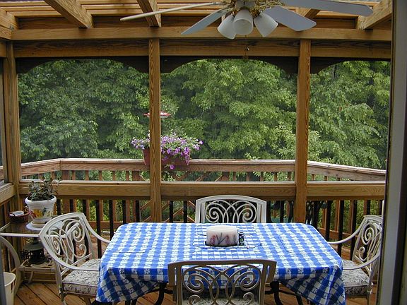 Enclosed deck w/ woods view