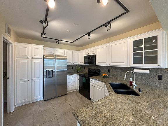 Kitchen, as viewed from breakfast area.