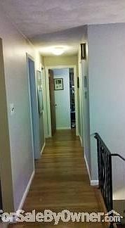Hallway main level
						:
						Looking towards bedrooms from top of stairs