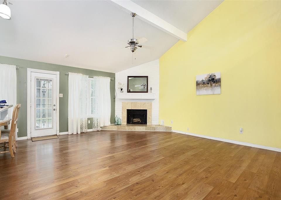 Large family room with fireplace.