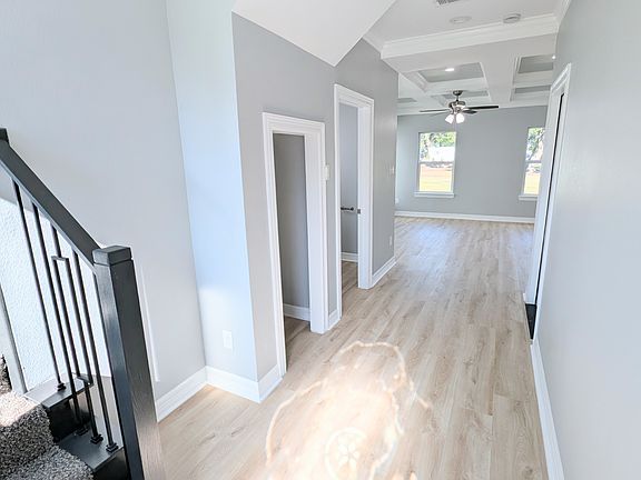 Gorgeous entry is spacious and well lit to welcome you home.