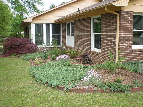 Front right side,Sunroom in back