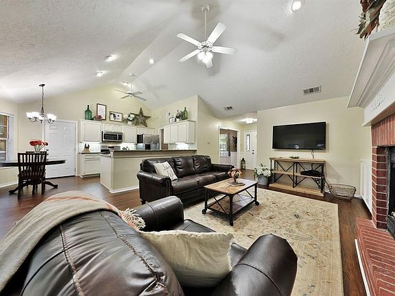 Living area is open to kitchen and breakfast, elevated ceilings throughout, light and bright!