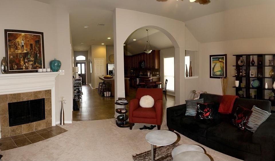 The open living room leads straight to the kitchen