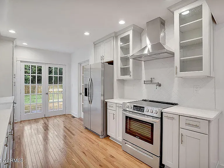 *original listing photo from when we purchased the home (kitchen)