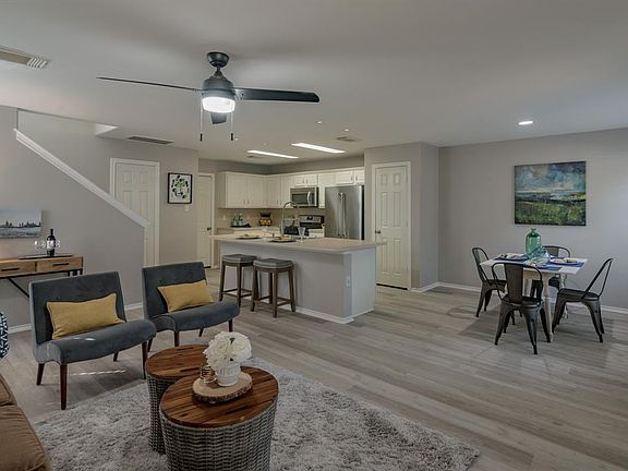 Step downstairs to this open floor plan kitchen, dining and family room.