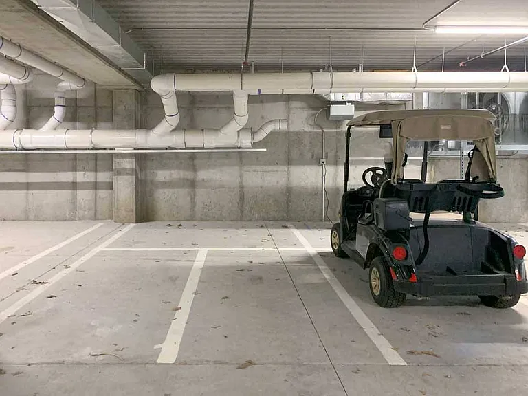 Our dedicated golf cart parking gives you a convenient spot to charge and store your ride right inside the garage.