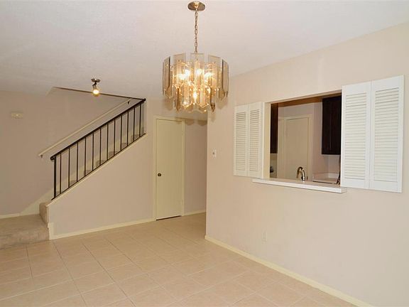 Dining Room with pass thru opening to kitchen.