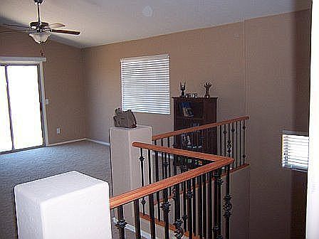 upstairs greatroom with slider to the deck