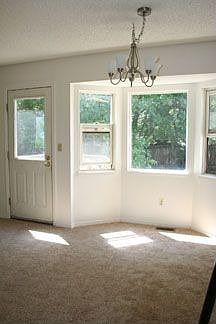 Dining faces shady back yard