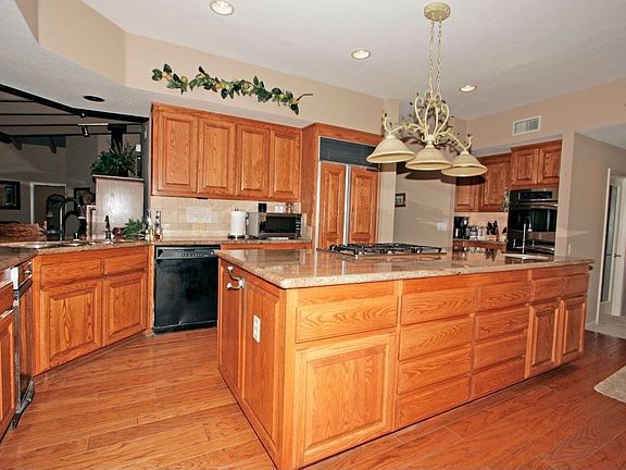 Incredible cooks kitchen with granite counter and Dacor gas cooktop