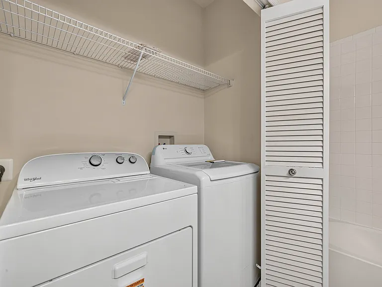 Upper level washer and dryer