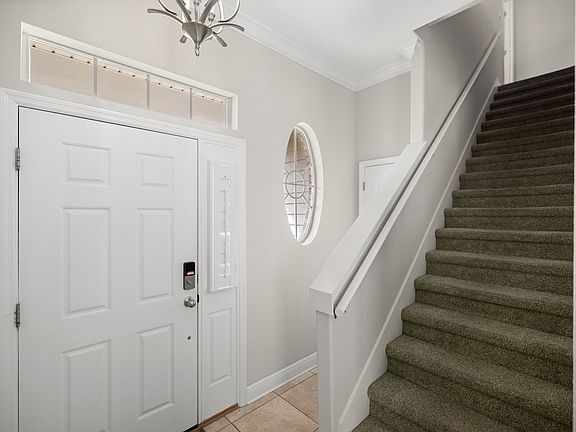 Front Entry, Stairs and Coat Closet