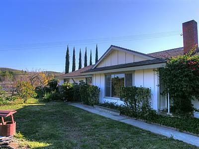 This beautiful home has just been repainted and features a new roof.