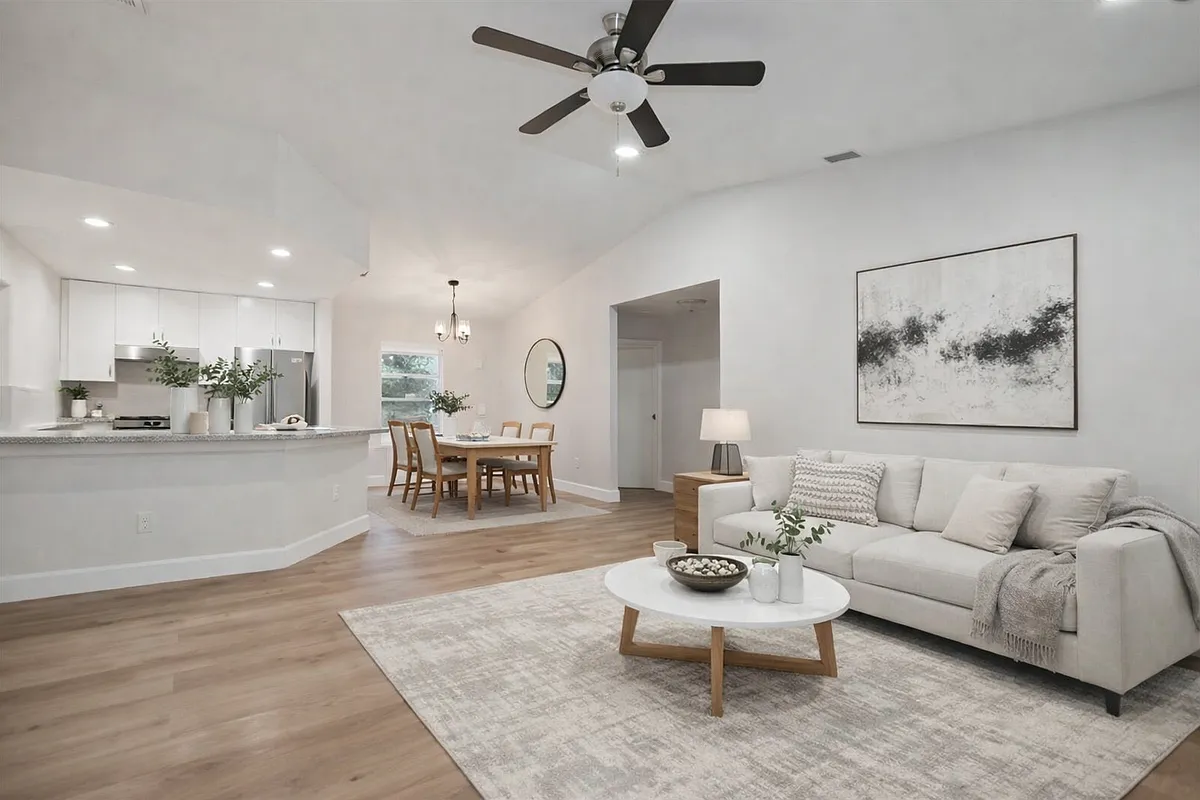 Open Concept: Living, dining with kitchen together - 8414 N River Dune St