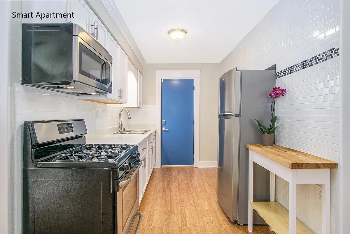 Modern Galley Kitchen, Dental Molding, Stone Counters, Stainless Steel Apliance, Custom Tile. - 1211 Pine St #1