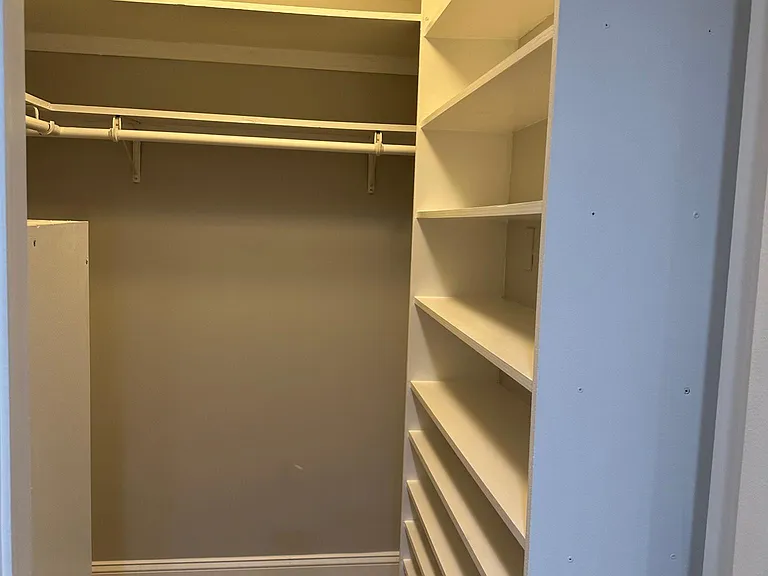 Master Bedroom walk in closet.