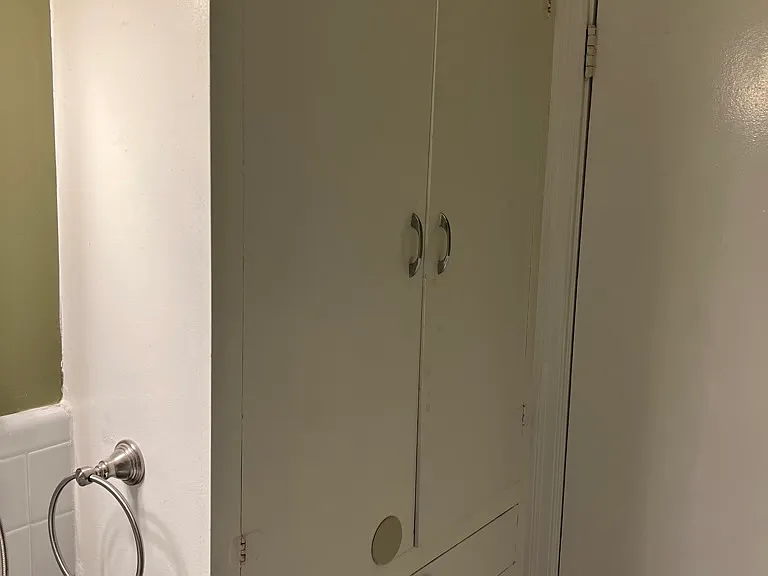 linen closet in bathroom