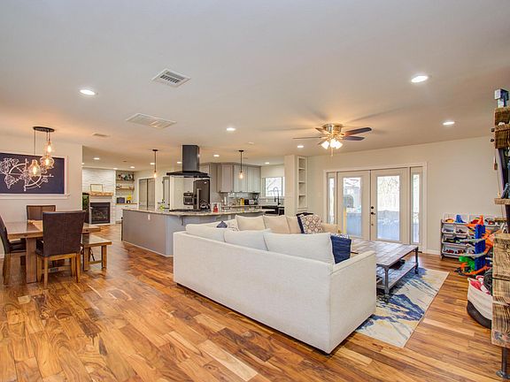 View from the front door - completely open concept to immediately see the dining, living and kitchen areas.