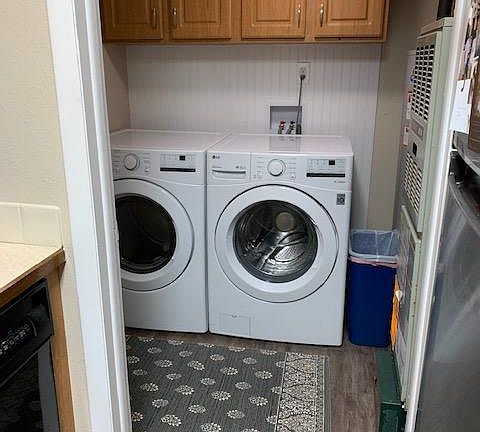 Laundry Room. 2 year-old washer/dryer. Leads to back door/car port.