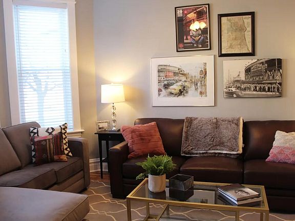 fabric couch has a queen pull out bed