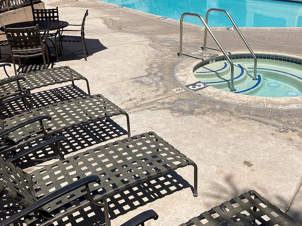 Perigee Pool and Spa Area with Lounge Chairs