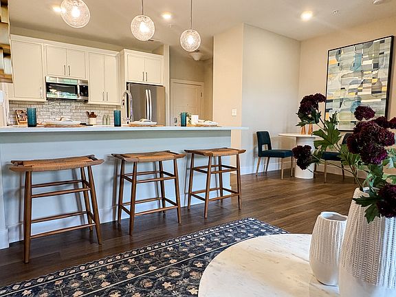 Modern White Kitchen with Stainless Steel Appliances