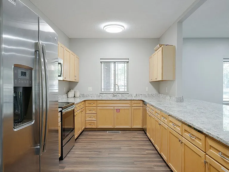 Host a group meal or event in our clubhouse community room, designed for community gatherings.