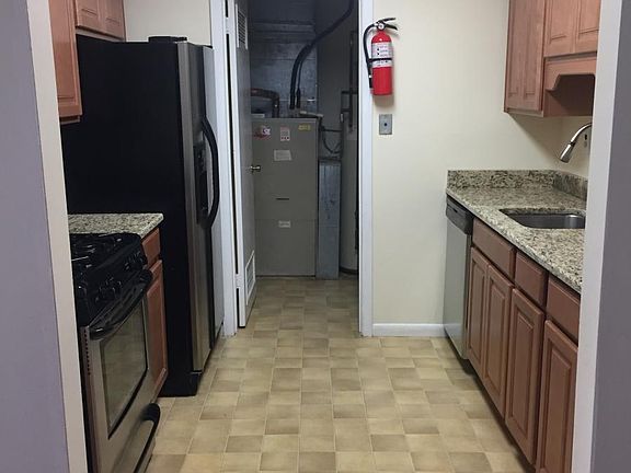 Kitchen and door to utility/laundry area