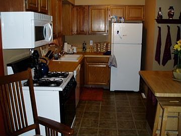 K- new tile (extends into 1/2 bath)- appliances can stay if price negotiated