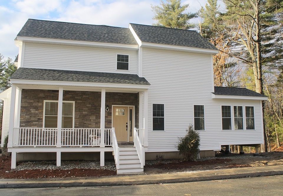Front view of the house with stone siding