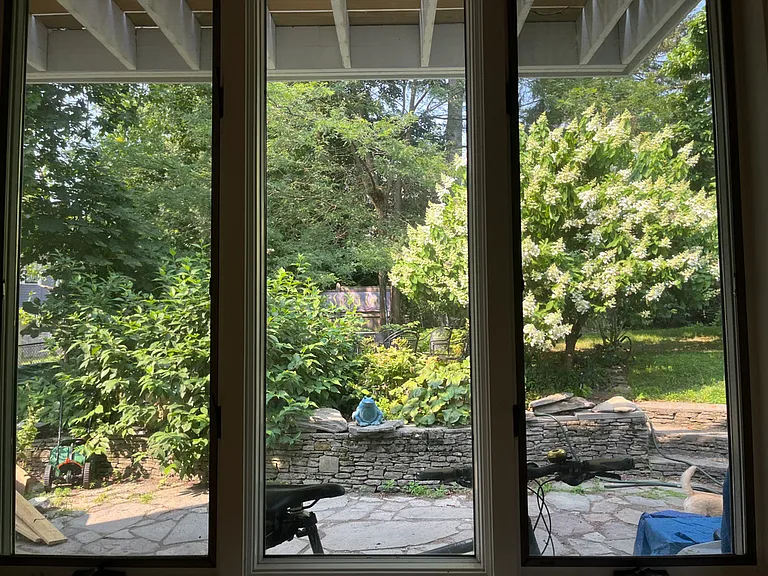 Entry from patio and gardens (That's a bike that snuck into the photo)