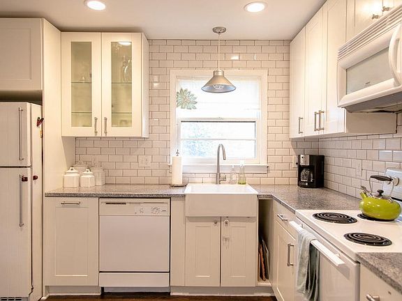 Farmhouse sink with view into the backyard